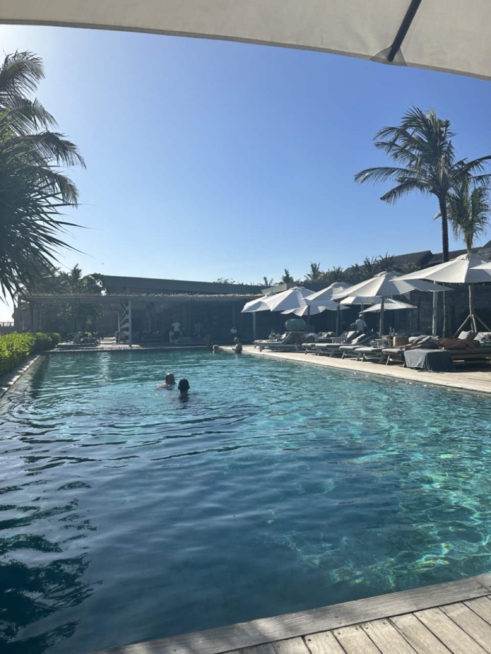 The smaller beach club pool at COMO Uma Canggu Beach Club